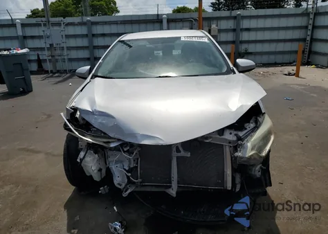 2015 Toyota Corolla L from USA, damaged, VIN 2T1BURHE0FC405551